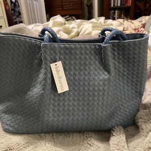 Lulu Dharma Cornflower Blue woven vegan leather tote.